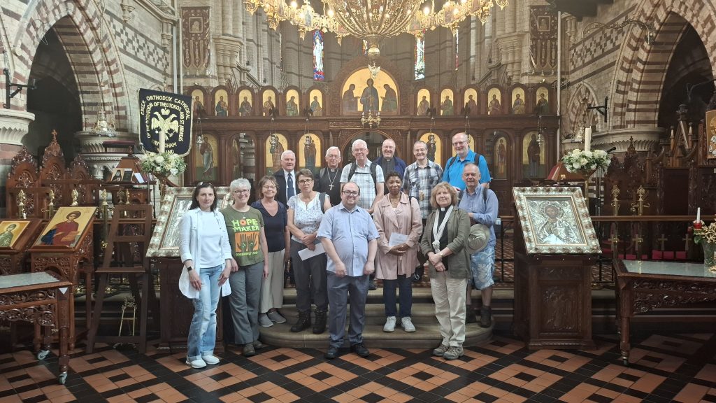 Pilgrims at the Greek Orthodox Cathedral of the Dormition of the Theotokos and St Andrew