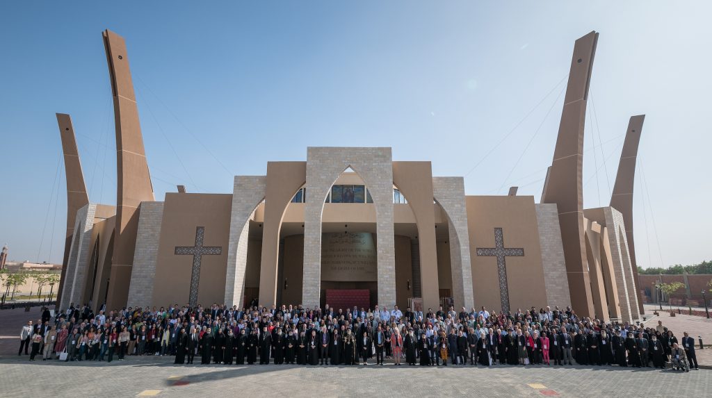 People gather for a photo on opening day of the World Council of Churches Sixth World Conference on Faith and Order taking place 24-28 October 2025. Credit Albin Hillert/WCC