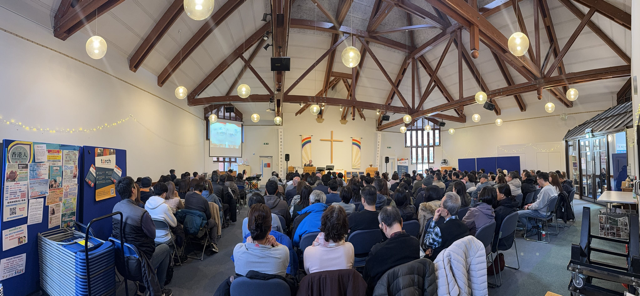 Photo of the inside of Trinity church, Earley with the congregations seated